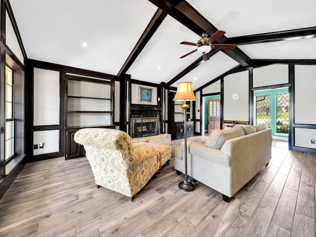 1770 Plummer Dr, Rockwall, TX 75087 - living room featuring a fireplace, ceiling fan, light wood-type flooring, and recessed lighting