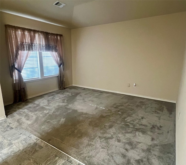 112 Jimmie Birdwell Blvd, Ferris, TX 75125 - spare room with visible vents, carpet flooring, and baseboards