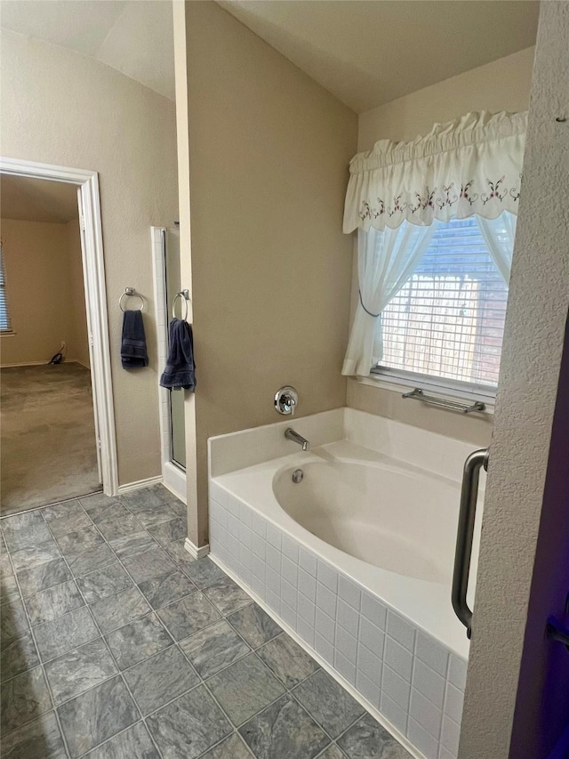 112 Jimmie Birdwell Blvd, Ferris, TX 75125 - full bath featuring a bath and a shower stall
