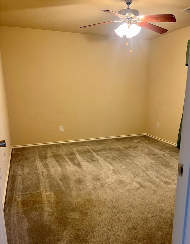 112 Jimmie Birdwell Blvd, Ferris, TX 75125 - carpeted spare room with baseboards, a ceiling fan, and visible vents