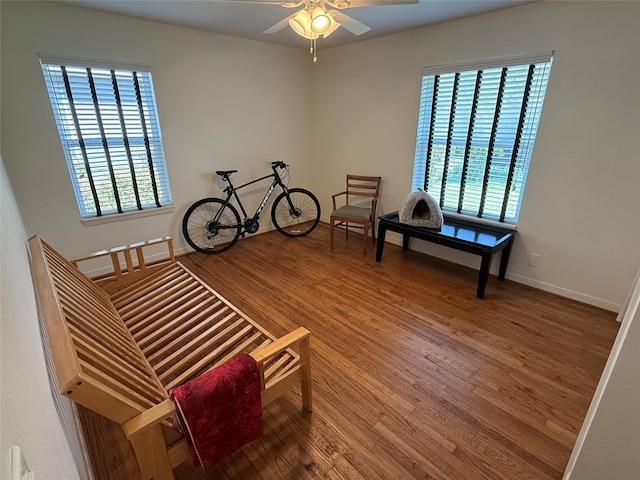 2365 Norwood Dr, Dallas, TX 75228 - living area with healthy amount of natural light, ceiling fan, and wood finished floors