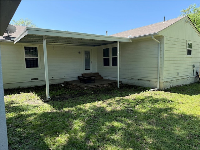 2365 Norwood Dr, Dallas, TX 75228 - rear view of house with a lawn and entry steps