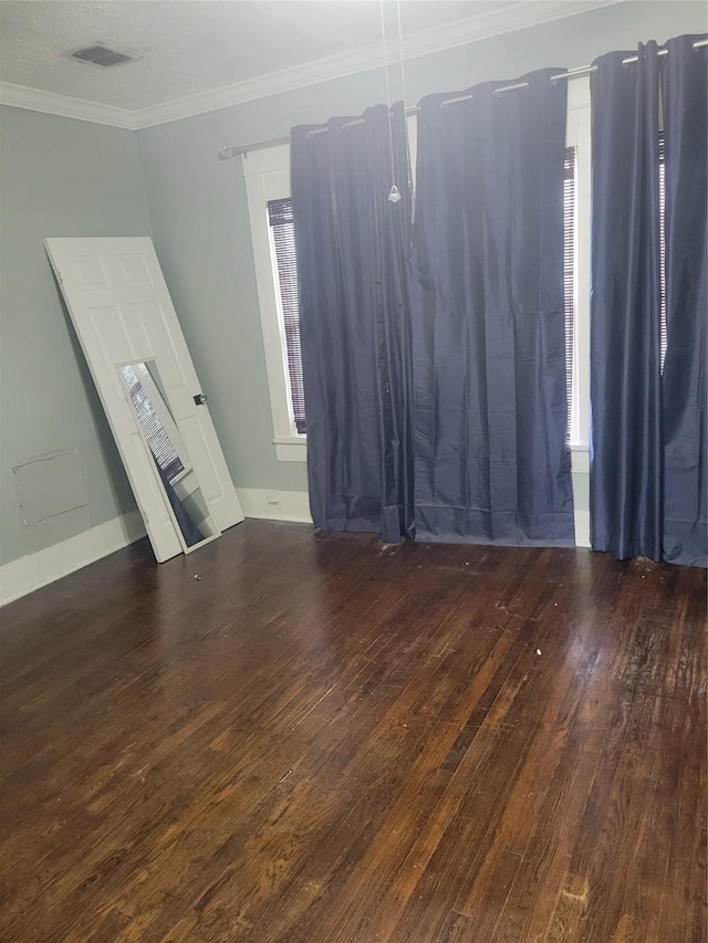 409 Forest Ave, Shreveport, LA 71104 - empty room featuring hardwood / wood-style floors and ornamental molding