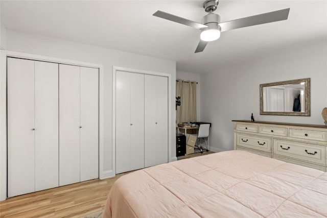 5925 E University Blvd Unit 133, Dallas, TX 75206 - bedroom featuring multiple closets, light wood finished floors, and a ceiling fan