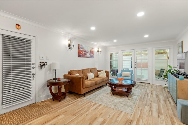 5925 E University Blvd Unit 133, Dallas, TX 75206 - living room with crown molding, wood finished floors, and recessed lighting