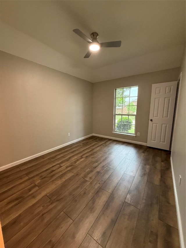 2610 Eganridge Ln, Rockwall, TX 75087 - empty room featuring dark wood-type flooring, ceiling fan, and baseboards