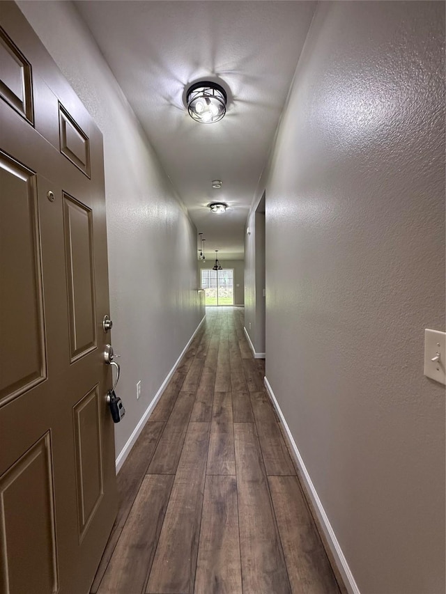2610 Eganridge Ln, Rockwall, TX 75087 - hall with dark wood-style flooring and baseboards