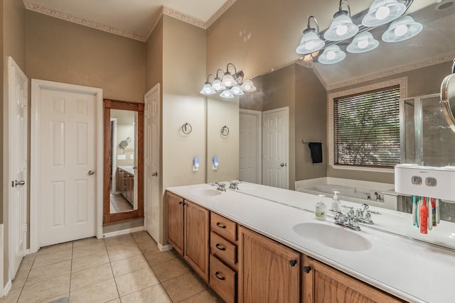 bathroom featuring a sink, a bath, and crown molding