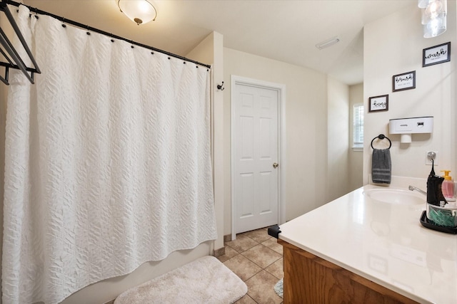 bathroom with visible vents, tile patterned flooring, vanity, and a shower with curtain