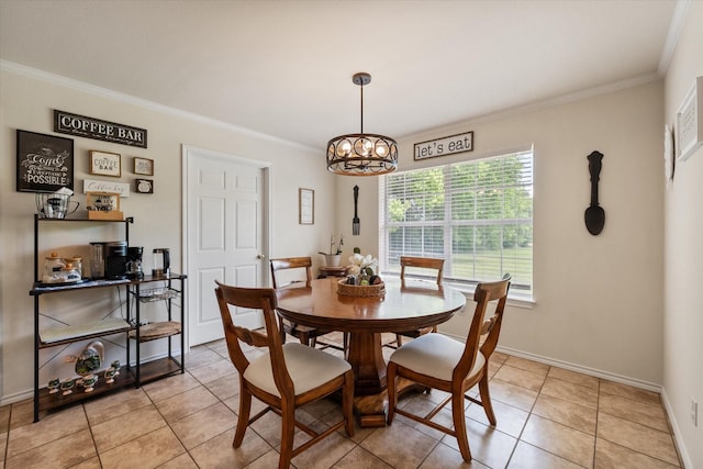 dining space with baseboards, a chandelier, light tile patterned floors, and crown molding