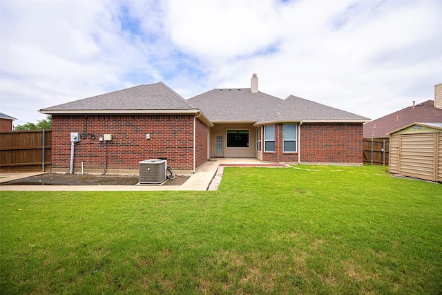 1919 Water Fall Way, Wylie, TX 75098 - back of house featuring brick siding, a patio area, a chimney, and central air condition unit