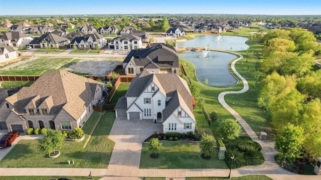 3101 Twin Eagles Dr, Celina, TX 75009 - birds eye view of property with a residential view and a water view
