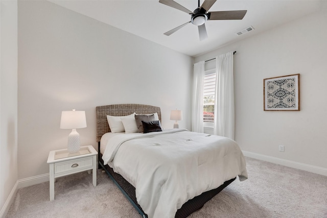 3101 Twin Eagles Dr, Celina, TX 75009 - bedroom with visible vents, baseboards, ceiling fan, and light carpet