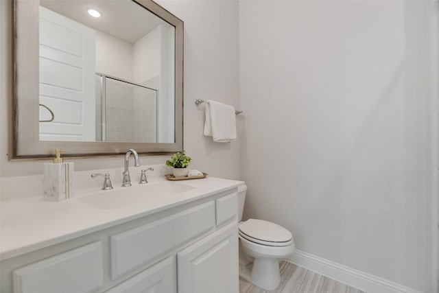 3101 Twin Eagles Dr, Celina, TX 75009 - bathroom featuring vanity, baseboards, and toilet