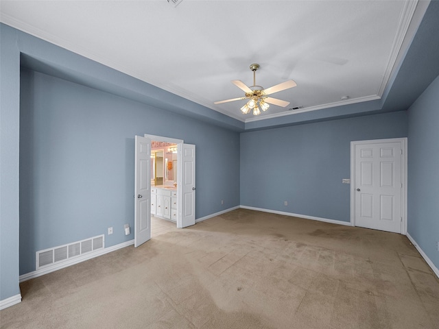 1213 Hills Creek Dr, Mckinney, TX 75072 - carpeted empty room featuring ceiling fan, baseboards, a raised ceiling, and crown molding