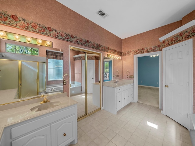1213 Hills Creek Dr, Mckinney, TX 75072 - full bath featuring two vanities, a shower stall, a bath, and tile patterned flooring
