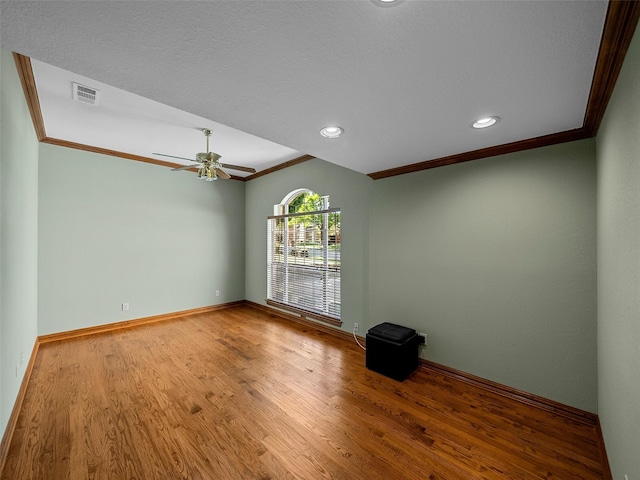 1213 Hills Creek Dr, Mckinney, TX 75072 - unfurnished room featuring ornamental molding, wood finished floors, baseboards, ceiling fan, and recessed lighting