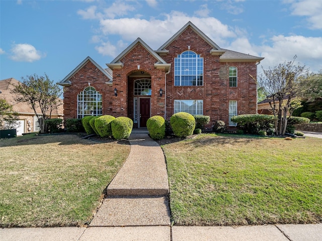 1213 Hills Creek Dr, Mckinney, TX 75072 - traditional home with brick siding and a front yard