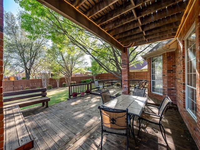 1213 Hills Creek Dr, Mckinney, TX 75072 - wooden terrace featuring a fenced backyard and outdoor dining space