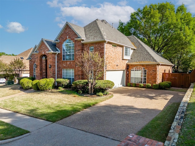 1213 Hills Creek Dr, Mckinney, TX 75072 - traditional home featuring brick siding, driveway, a shingled roof, and an attached garage