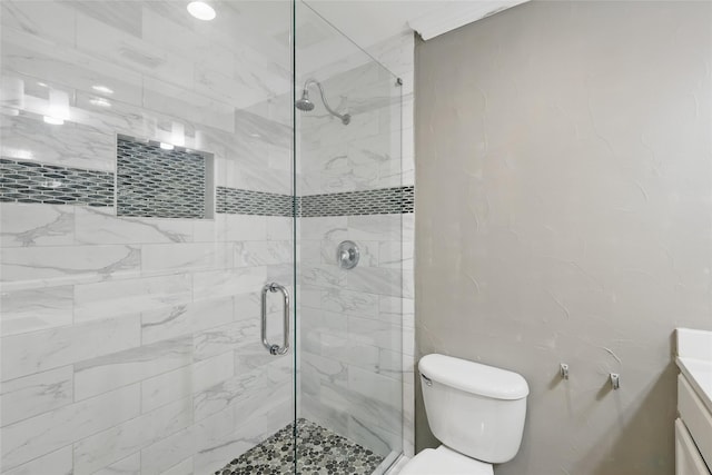 1951 Pin Oak Dr, Flower Mound, TX 75028 - bathroom with a shower stall, toilet, and vanity