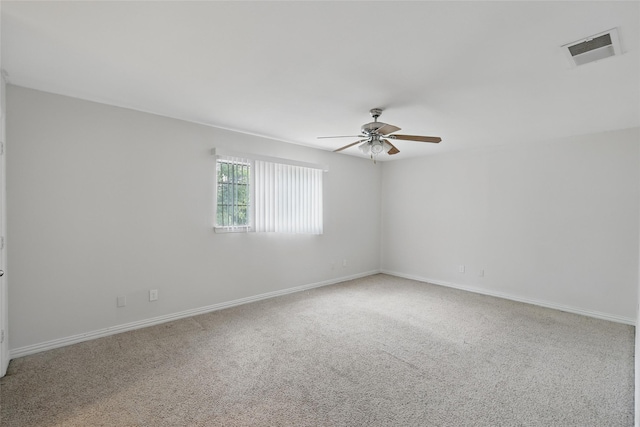1951 Pin Oak Dr, Flower Mound, TX 75028 - carpeted spare room featuring a ceiling fan and baseboards
