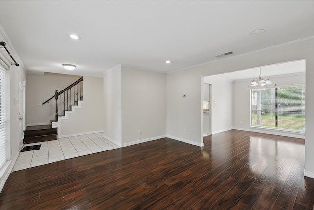 1951 Pin Oak Dr, Flower Mound, TX 75028 - unfurnished living room with wood finished floors, a chandelier, stairway, baseboards, and ornamental molding
