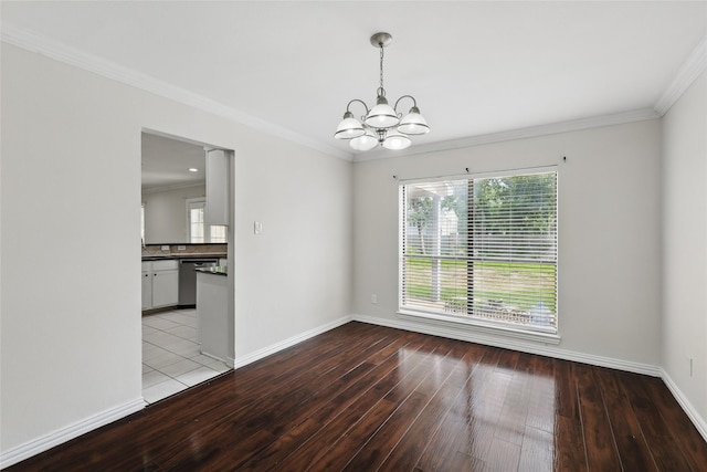 1951 Pin Oak Dr, Flower Mound, TX 75028 - empty room featuring wood-type flooring, a chandelier, baseboards, and ornamental molding