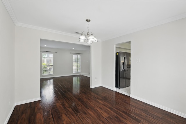 1951 Pin Oak Dr, Flower Mound, TX 75028 - empty room with a chandelier, wood-type flooring, crown molding, and baseboards