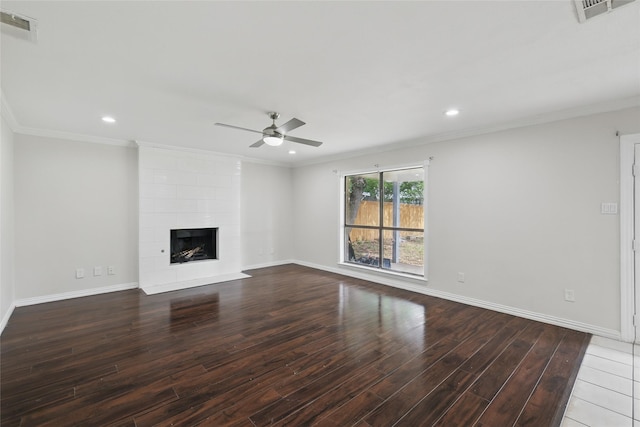 1951 Pin Oak Dr, Flower Mound, TX 75028 - unfurnished living room with wood finished floors, a ceiling fan, ornamental molding, baseboards, and a tiled fireplace