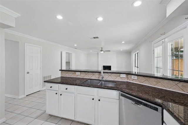 1951 Pin Oak Dr, Flower Mound, TX 75028 - kitchen with dishwasher, a sink, a ceiling fan, decorative backsplash, and dark stone countertops