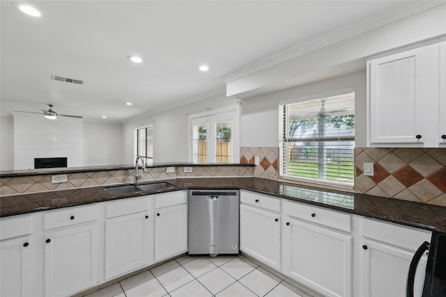 1951 Pin Oak Dr, Flower Mound, TX 75028 - kitchen featuring dishwasher, a sink, healthy amount of natural light, ceiling fan, and ornamental molding