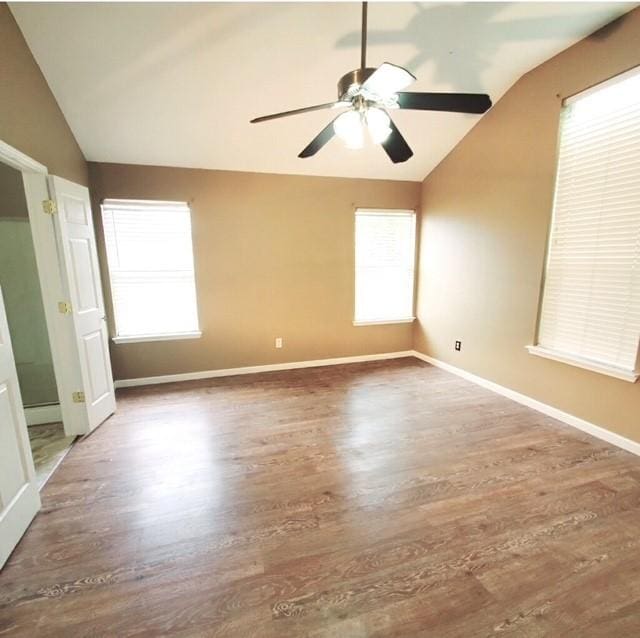 518 Lonestar Park Ln, Ponder, TX 76259 - unfurnished bedroom with lofted ceiling, wood finished floors, and ceiling fan