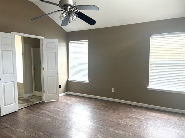 518 Lonestar Park Ln, Ponder, TX 76259 - unfurnished bedroom with lofted ceiling, wood finished floors, a ceiling fan, and baseboards