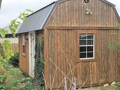 518 Lonestar Park Ln, Ponder, TX 76259 - laundry area with baseboards, marble finish floor, laundry area, and washing machine and dryer