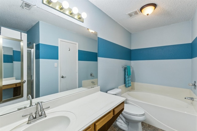 bathroom with a bath, toilet, a textured ceiling, and a stall shower