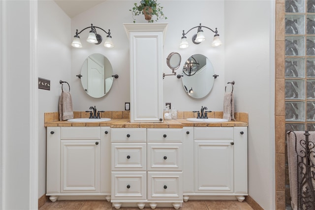 10248 N Poetry Ln, Terrell, TX 75160 - full bathroom with a sink, double vanity, and tile patterned flooring