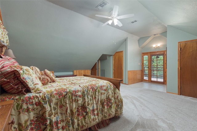 10248 N Poetry Ln, Terrell, TX 75160 - carpeted bedroom featuring access to outside, lofted ceiling, visible vents, and a wainscoted wall
