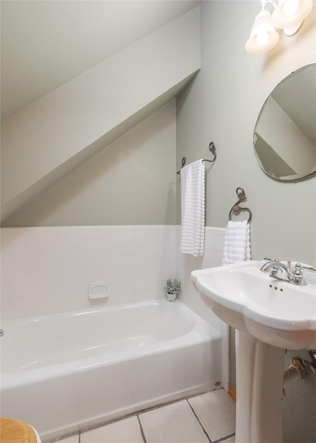 10248 N Poetry Ln, Terrell, TX 75160 - bathroom featuring tile patterned flooring and a bath
