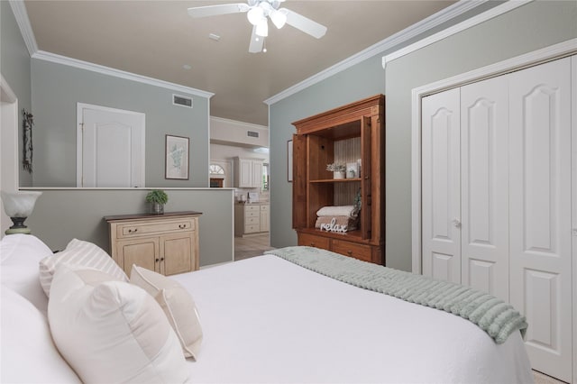 10248 N Poetry Ln, Terrell, TX 75160 - bedroom featuring ceiling fan, ensuite bathroom, a closet, ornamental molding, and visible vents