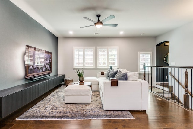 living area featuring ceiling fan, recessed lighting, visible vents, and hardwood / wood-style flooring