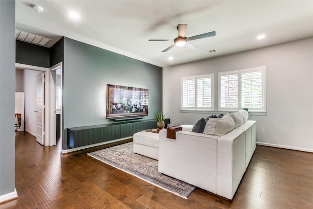 living area featuring wood finished floors, ceiling fan, visible vents, and recessed lighting