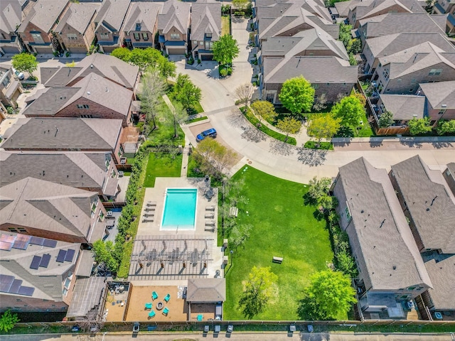 birds eye view of property with a residential view