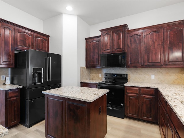 6813 Falconer Way, Fort Worth, TX 76179 - kitchen featuring black appliances, a kitchen island, light stone countertops, decorative backsplash, and recessed lighting