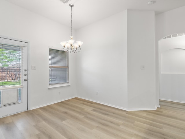 6813 Falconer Way, Fort Worth, TX 76179 - unfurnished dining area featuring light wood-style flooring and a chandelier