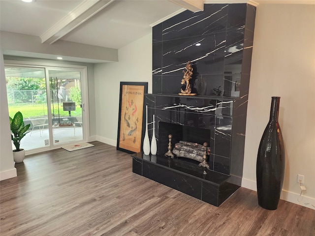 5515 Enchanted Ln, Dallas, TX 75227 - living area featuring beamed ceiling, baseboards, and wood finished floors