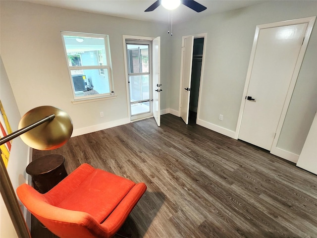 5515 Enchanted Ln, Dallas, TX 75227 - sitting room featuring dark wood finished floors, baseboards, and a ceiling fan