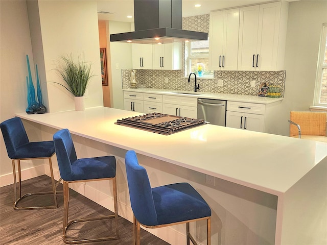 5515 Enchanted Ln, Dallas, TX 75227 - kitchen featuring island exhaust hood, dishwasher, stovetop, a sink, and wood finished floors