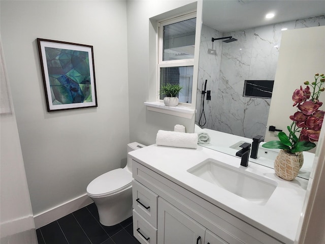 5515 Enchanted Ln, Dallas, TX 75227 - full bathroom with a marble finish shower, toilet, vanity, tile patterned floors, and baseboards