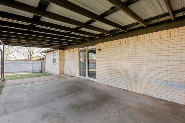 view of patio / terrace featuring fence